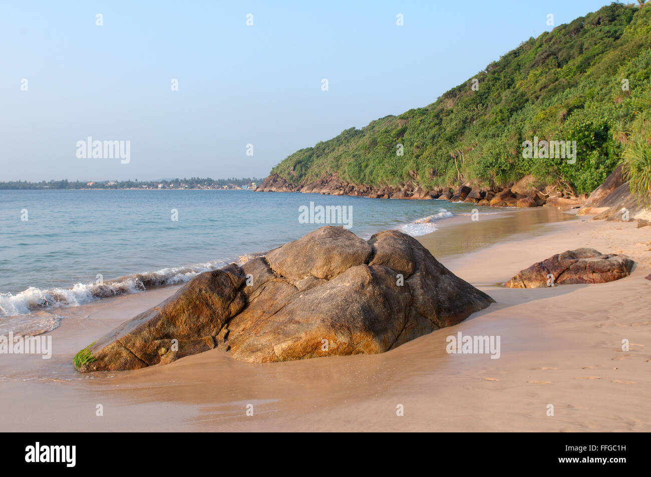 rocky shore on 'Jungle Beach', Hikkaduwa, Sri Lanka, South Asia Stock Photo