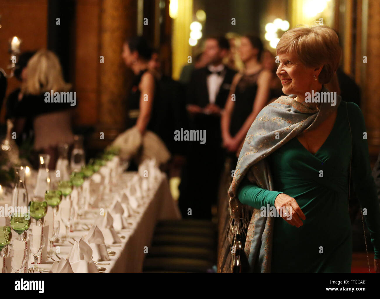 Hamburg, Germany. 12th Feb, 2016. Friede Springer (R), German publisher and widow of Axel Springer, arrives to the Matthiae dinner at the city hall of Hamburg, Germany, 12 February 2016. Britain's Prime Minister David Cameron and German Chancellor Angela Merkel are guests of honour at the oldest feast in the world. Since 1356, the leaders of the Hansa city invite distinguished guests to the Matthiae dinner. Photo: CHRISTIAN CHARISIUS/dpa/Alamy Live News Stock Photo