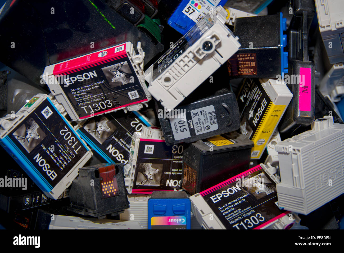 A mixed selection of Epson, HP, and canon inks ready for recycling Stock Photo