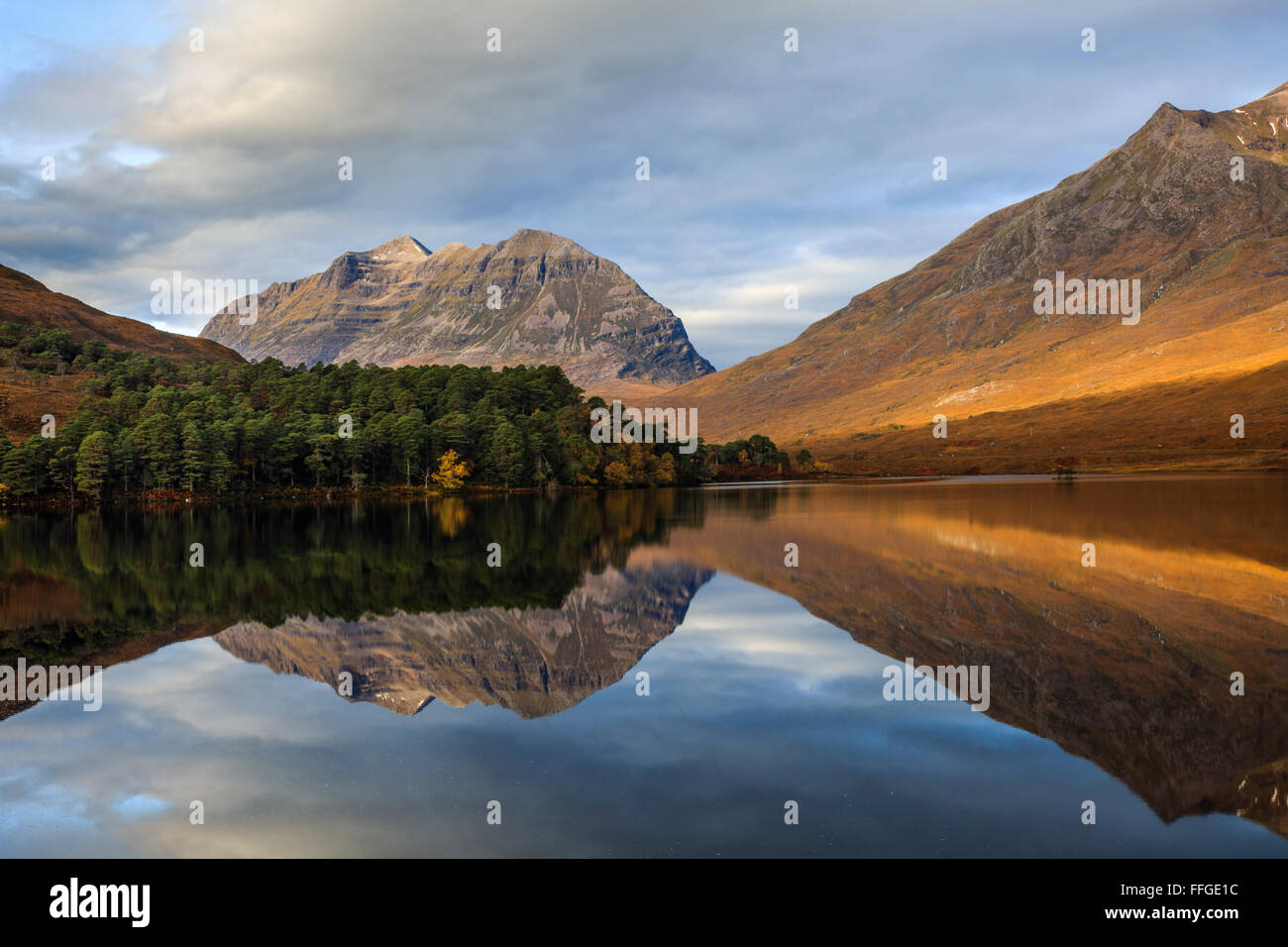 Laithach reflected in Loch Claire, in Glen Torridon, Scotland Stock Photo