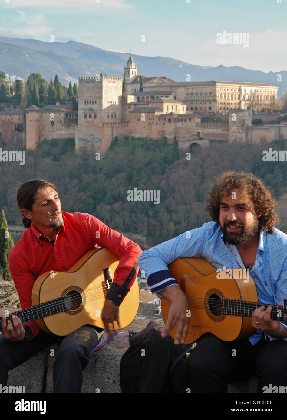 Gypsies playing guitar at Mirador de San Nicolas, Granada, Spain. Stock Photo