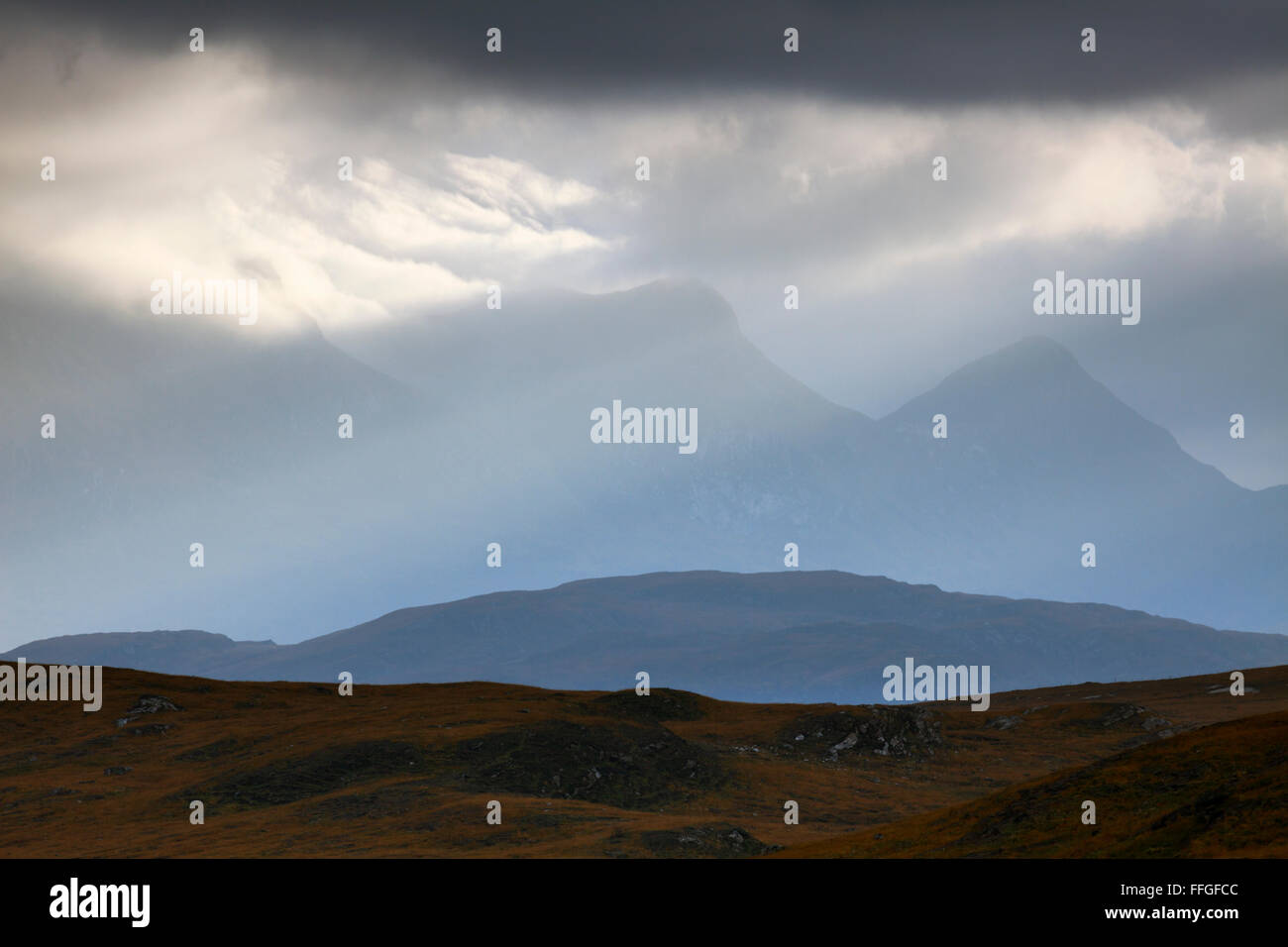 The peaks of Ben Loyal captured from high ground near Talmine. Stock Photo