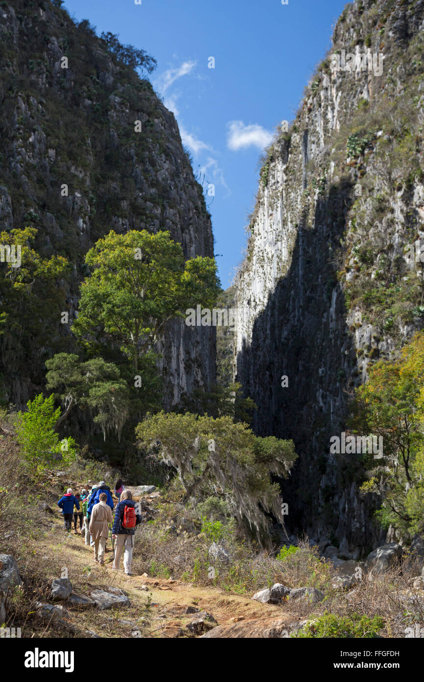 Santiago Apoala, Oaxaca, Mexico - Tourists hike near the village of Apoala, a small mountain town. Stock Photo