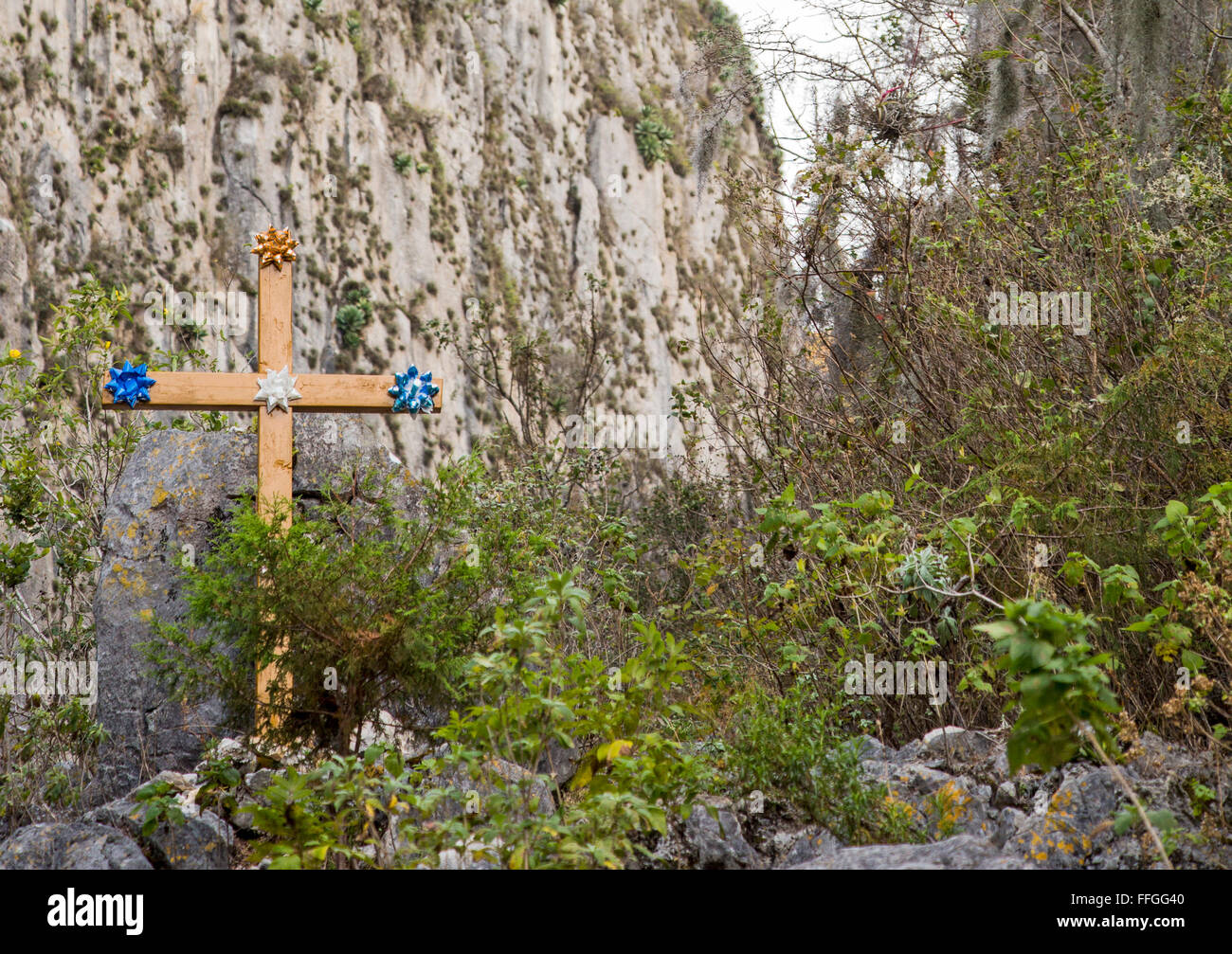 Santiago Apoala, Oaxaca, Mexico - A cross stands at the entrance to a canyon near the village of Apoala, a small mountain town. Stock Photo