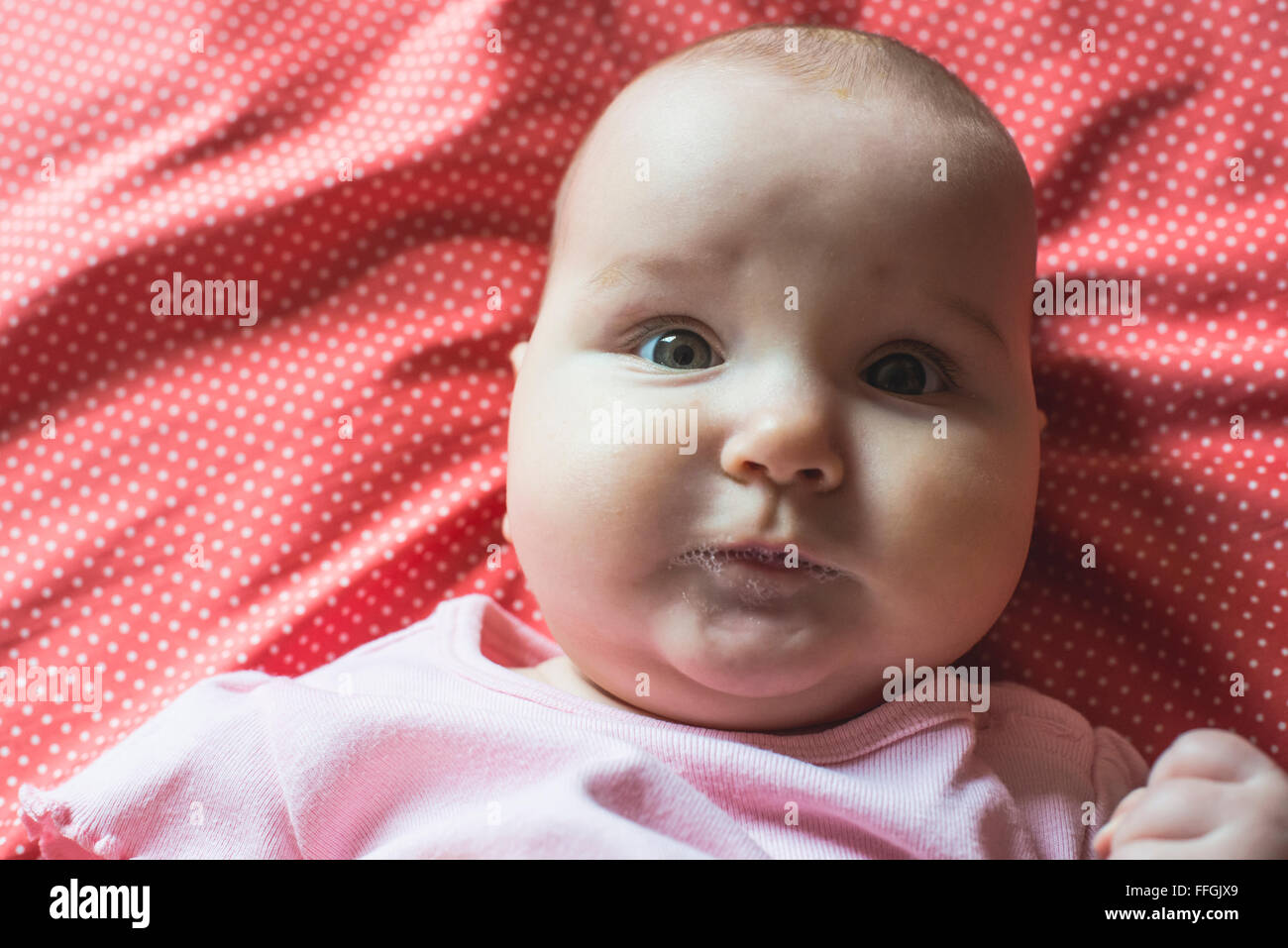 Baby in a bed. Text baby Stock Photo - Alamy