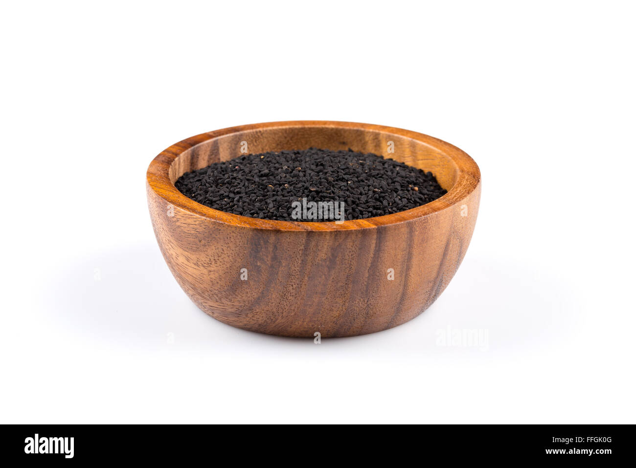 Sesame black seeds in wooden bowl isolated on white background Stock ...