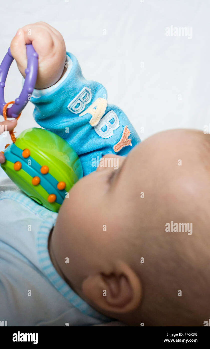 Baby in a bed. Text baby Stock Photo