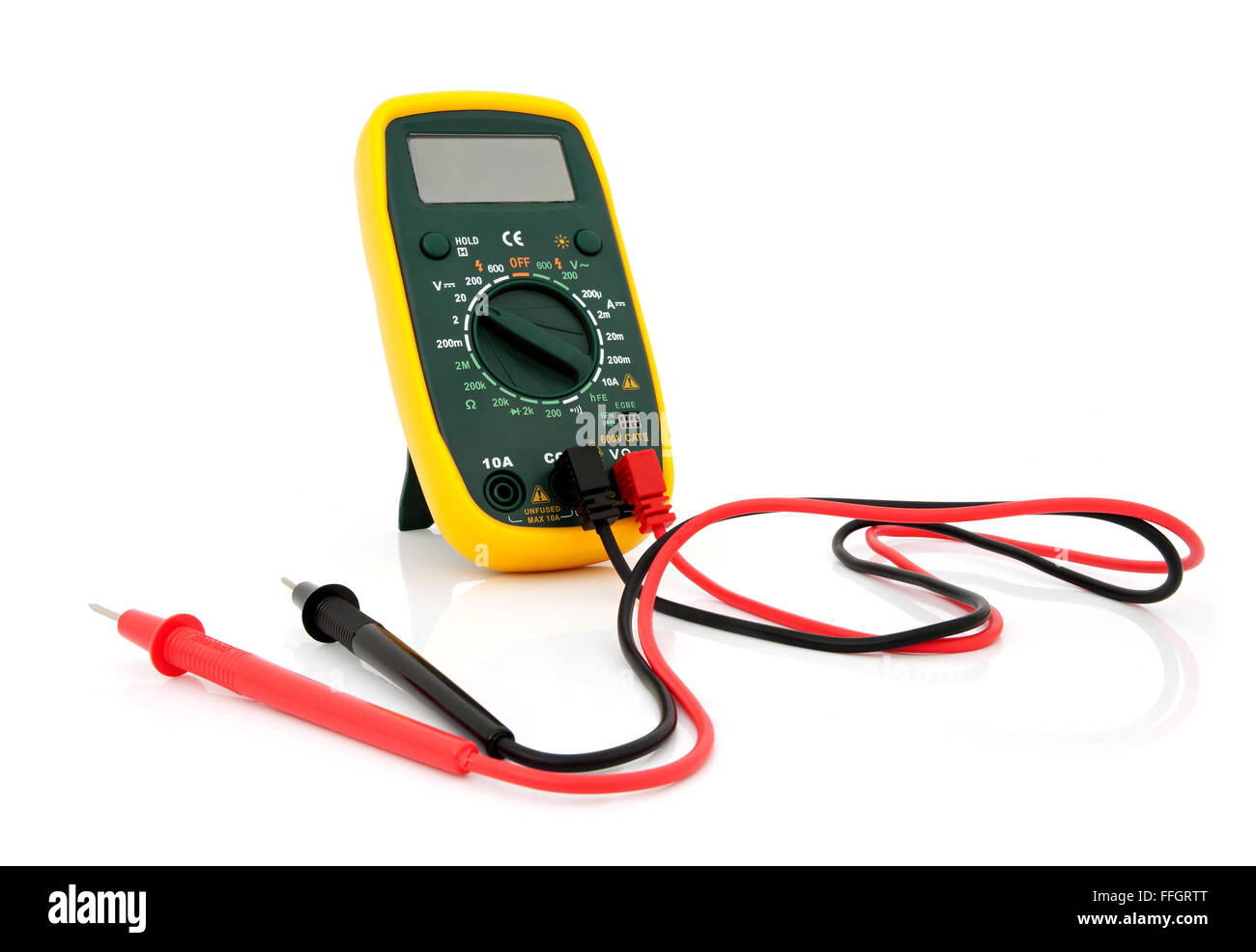 Multimeter for a measurement of a voltage, current and resistance with cables isolated on a white background Stock Photo