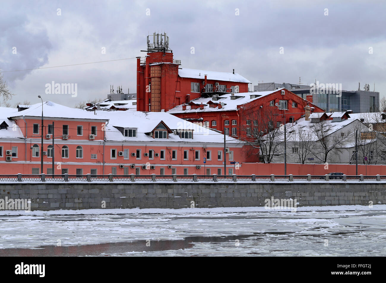 The embankment of the river Moscow in the winter against the backdrop of ancient buildings Stock Photo