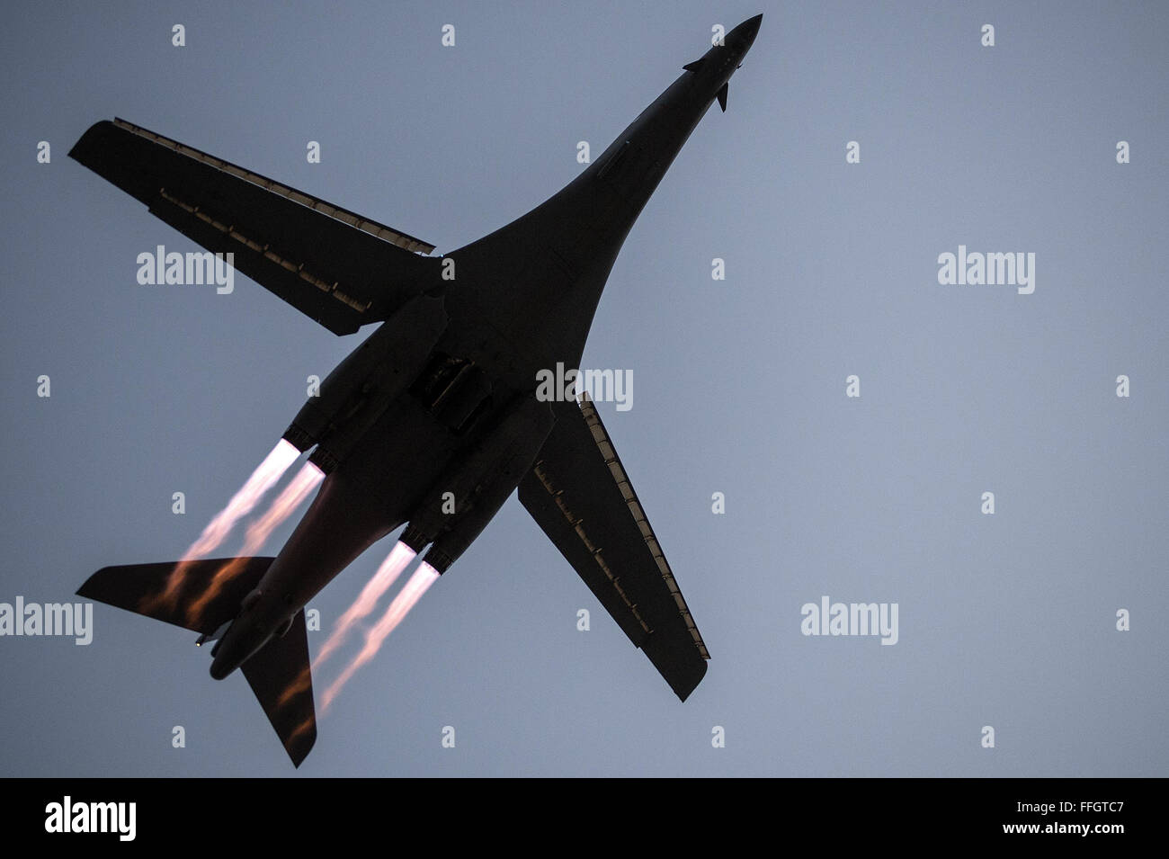 A B-1B Lancer takes off from Al Udeid Air Base, Qatar, to conduct combat operations April 8, 2015. Al Udeid is a strategic coalition air base in Qatar that supports over 90 combat and support aircraft and houses more than 5,000 military personnel. Stock Photo