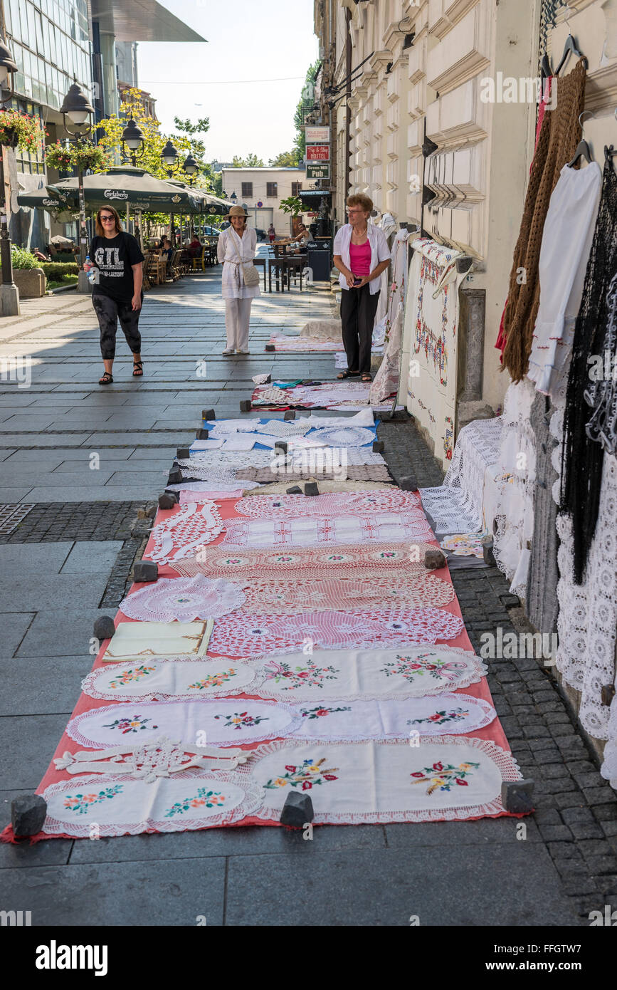 Street vendor selling crochet tablecloths at Knez Mihailova (Prince Michael) Street in Belgrade, Serbia Stock Photo