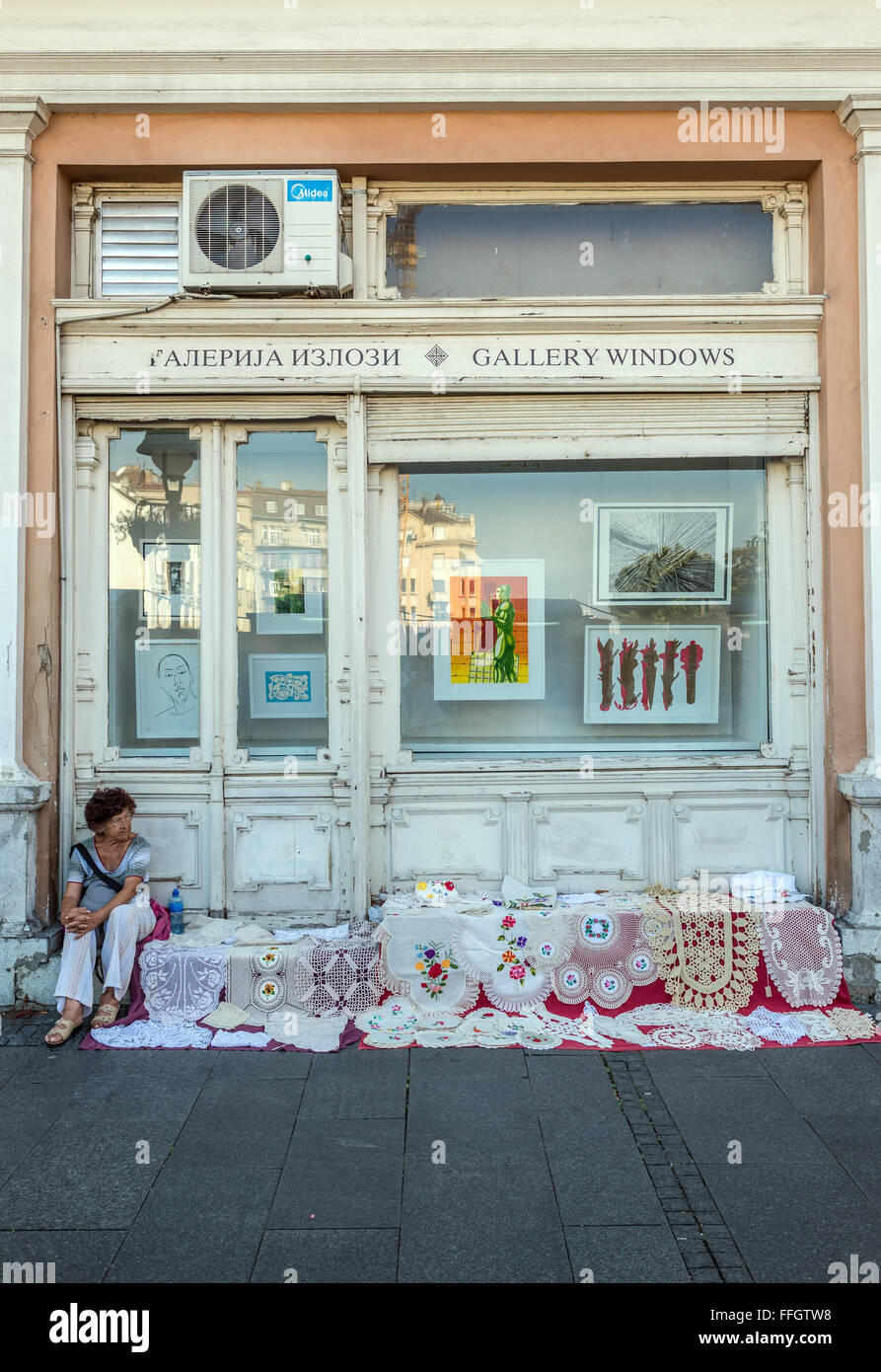 Street vendor selling crochet tablecloths at Knez Mihailova (Prince Michael) Street in Belgrade, Serbia Stock Photo