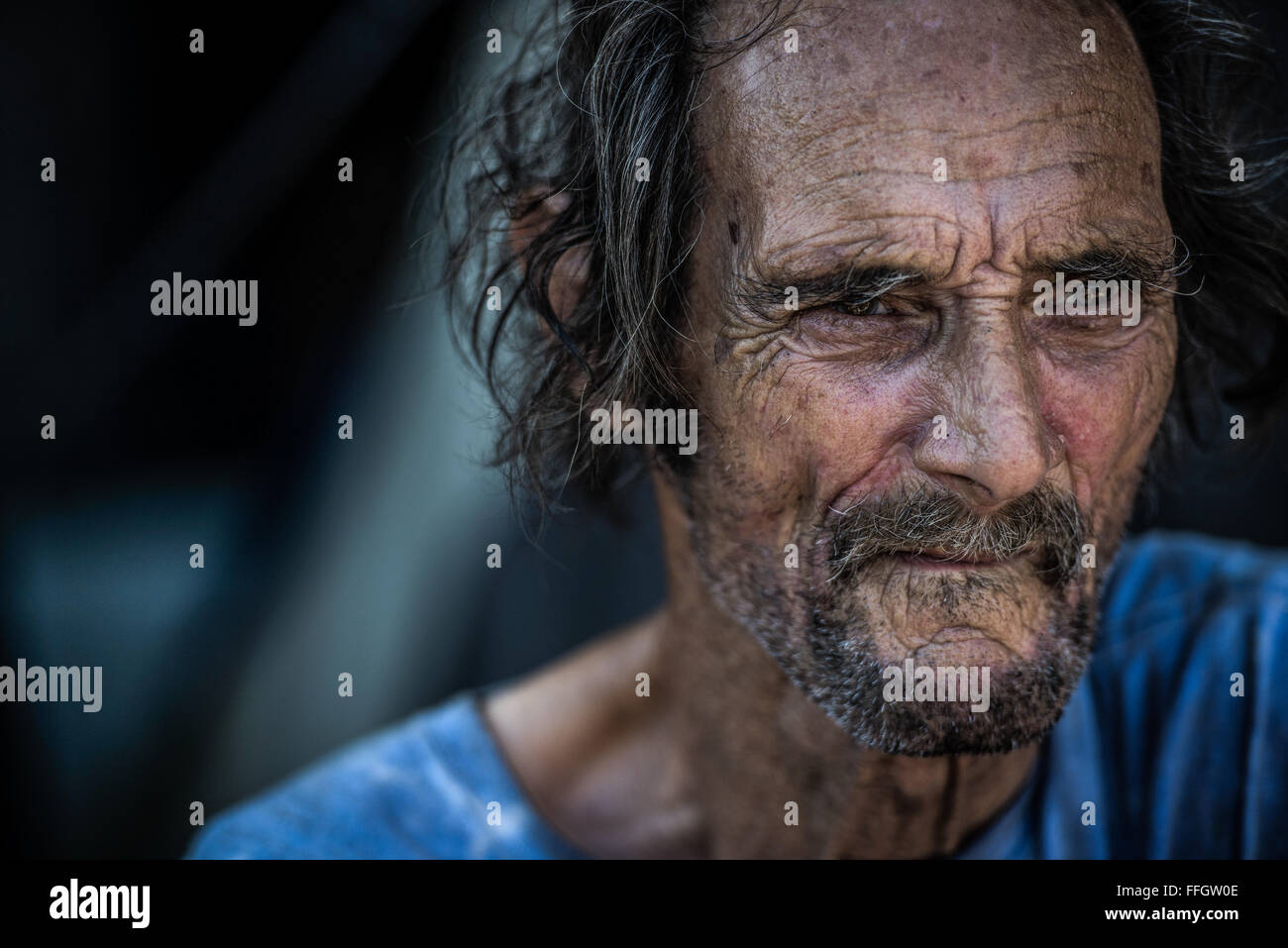 Kirk Miller, 70, lives under a bridge in El Monte, California. He's been homeless for more than a year. Although Vet Hunters search for veterans to assist, they also try to help the community and and help other homeless individuals, as well. Stock Photo