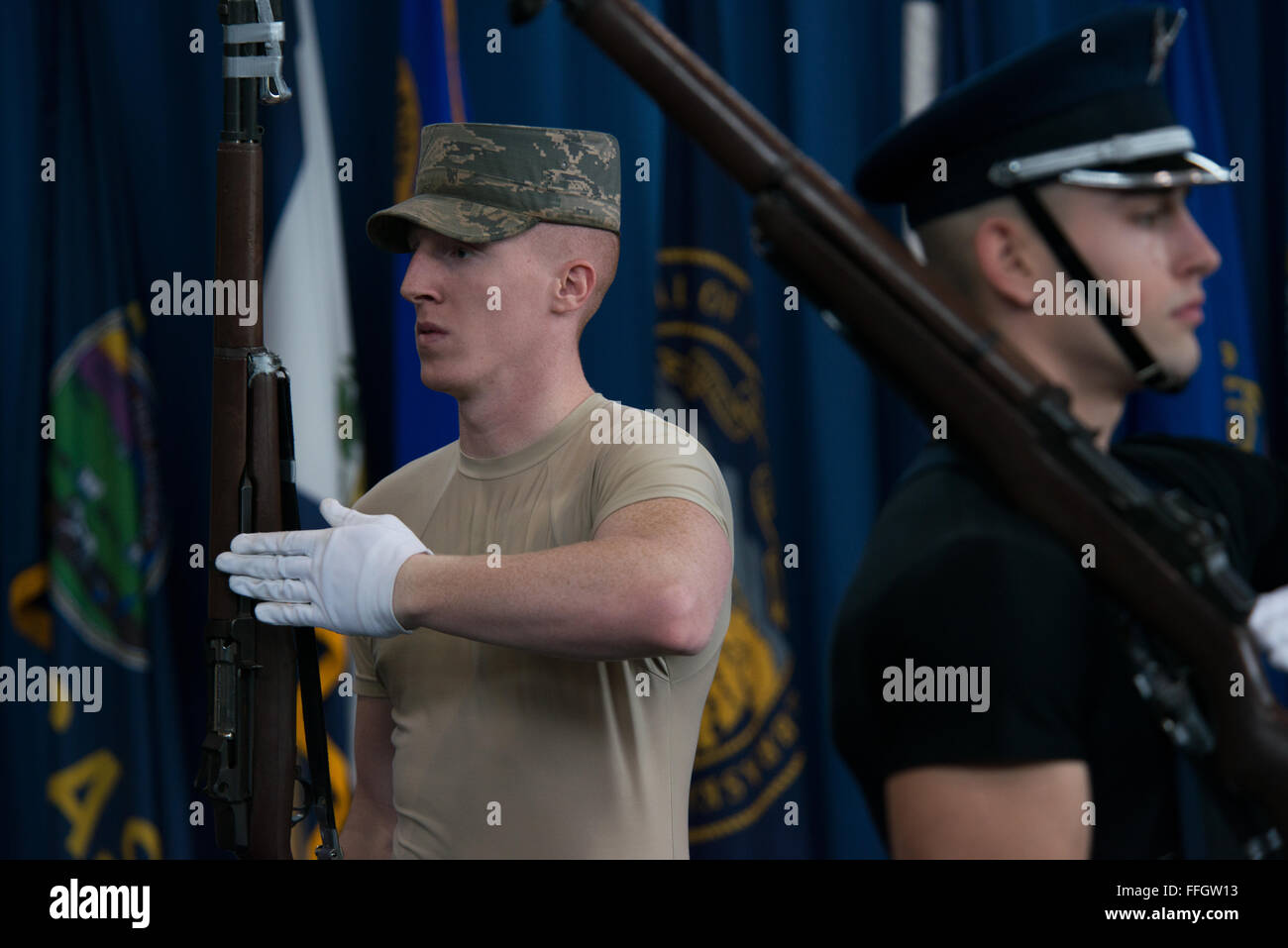 Staff Sgt. Alexander Wilson, drill team NCO in charge of training, throws a rifle during a U.S. Air Force Honor Guard Drill Team's 4-rifle team qualification test for Airman 1st Class Larry Brown at Joint Base Anacostia-Bolling, Md. Stock Photo