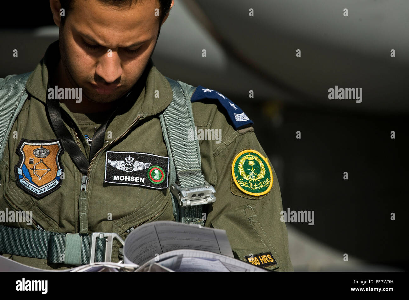 Saudi Pilot Royal Saudi Air Force Capt. Mohsen, F-15 Strike Eagle pilot, looks over ...