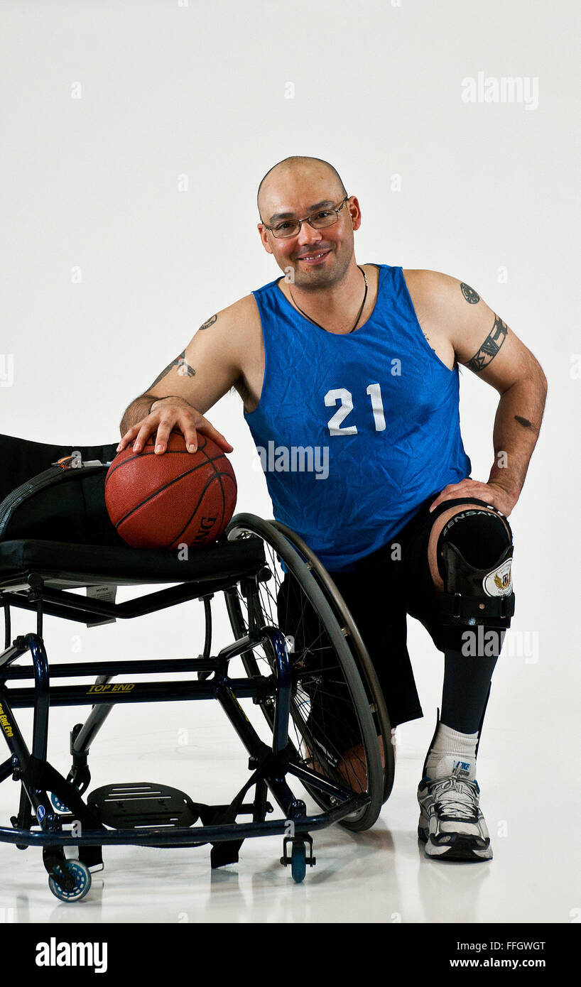 Name: Master Sgt. Christopher Aguilera                                                       Age: 37  Hometown: El Paso, Texas  Current residence: Las Vegas, Nev.  Years in service: 18   Injury/disability: In a 2010 helicopter crash in Afghanistan, he sustained a broken ankle, back, collarbone, hip, jaw, sternum, punctured lung and left upper hamstring, burns over 20 percent of his body, and traumatic brain injury.  Sport/sports: Shooting, track and field, wheelchair basketball and sitting volleyball  What do the Warrior Games mean to you?  To me, it’s the camaraderie between fellow wounded wa Stock Photo