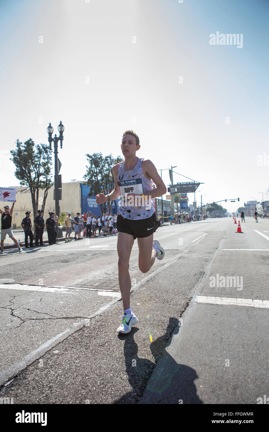 LA, California, USA. 13th Feb, 2016. Galen Rupp kicks away from the field to win the mens race in 2:11:13 at the 2016 U.S. Olympic Team trials in Los Angeles California Stock Photo
