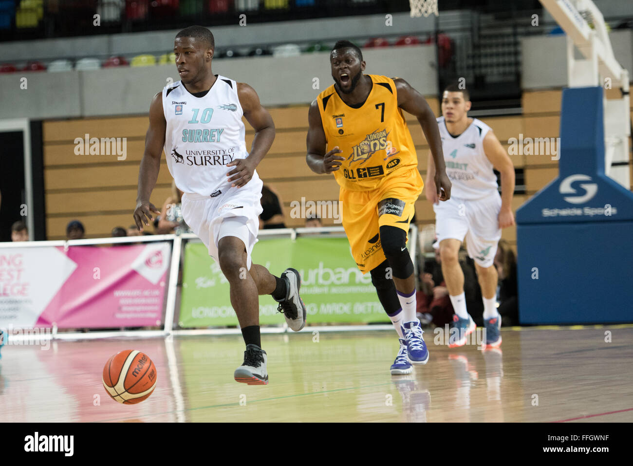 London, UK. 13th Feb, 2016. Surrey Scorchers K.C. Ross-Miller (10) being chased by Joe Ikhinmwin (07) London Lions Captain, Surrey beat the Lions (90 vs 82)at the Copper Box, London Olympic Park. Credit:  pmgimaging/Alamy Live News Stock Photo