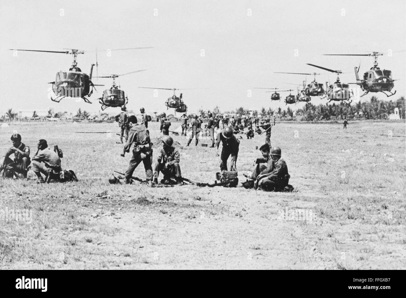 U.S. helicopters arrive to airlift Vietnamese government rangers of the 43rd Battalion into battle against Viet Cong guerrillas in Saigon in 1965. Stock Photo