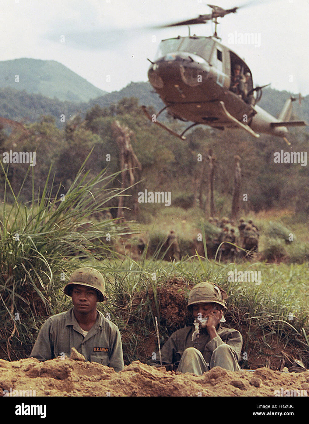 UH-1D Huey tactical transport helicopters are used to move troops of the 2nd Battalion into the assault area near Bong Son to search for the Viet Cong during Operation White Wing in 1966. Stock Photo