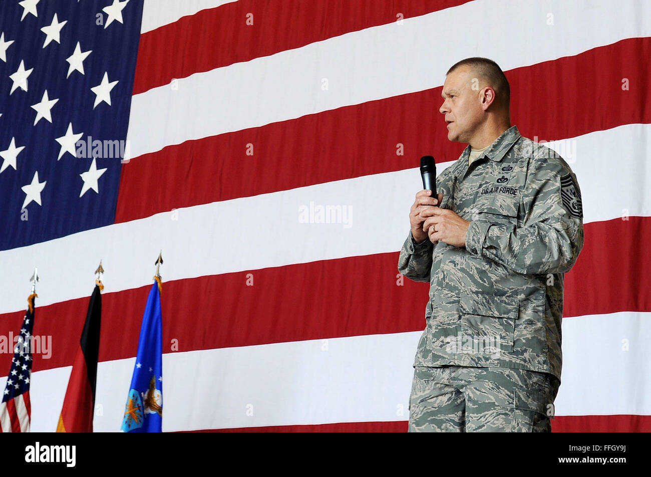 Chief Master Sgt. of the Air Force James A. Roy speaks to Airmen during an enlisted call at Ramstein Air Base, Germany. Roy and his wife, Paula, visited the 603rd Air Operations Center, 435th Contingency Response Group and Landstuhl Regional Medical Center. Stock Photo