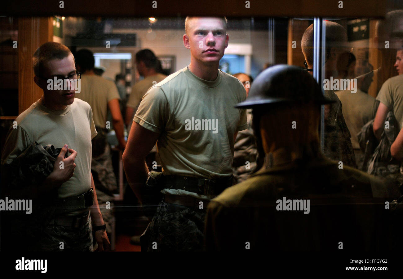 Basic trainees, Airman Jake Gustafson and Airman Basic Andrew Wood, view a historical World War II display at the museum. Stock Photo