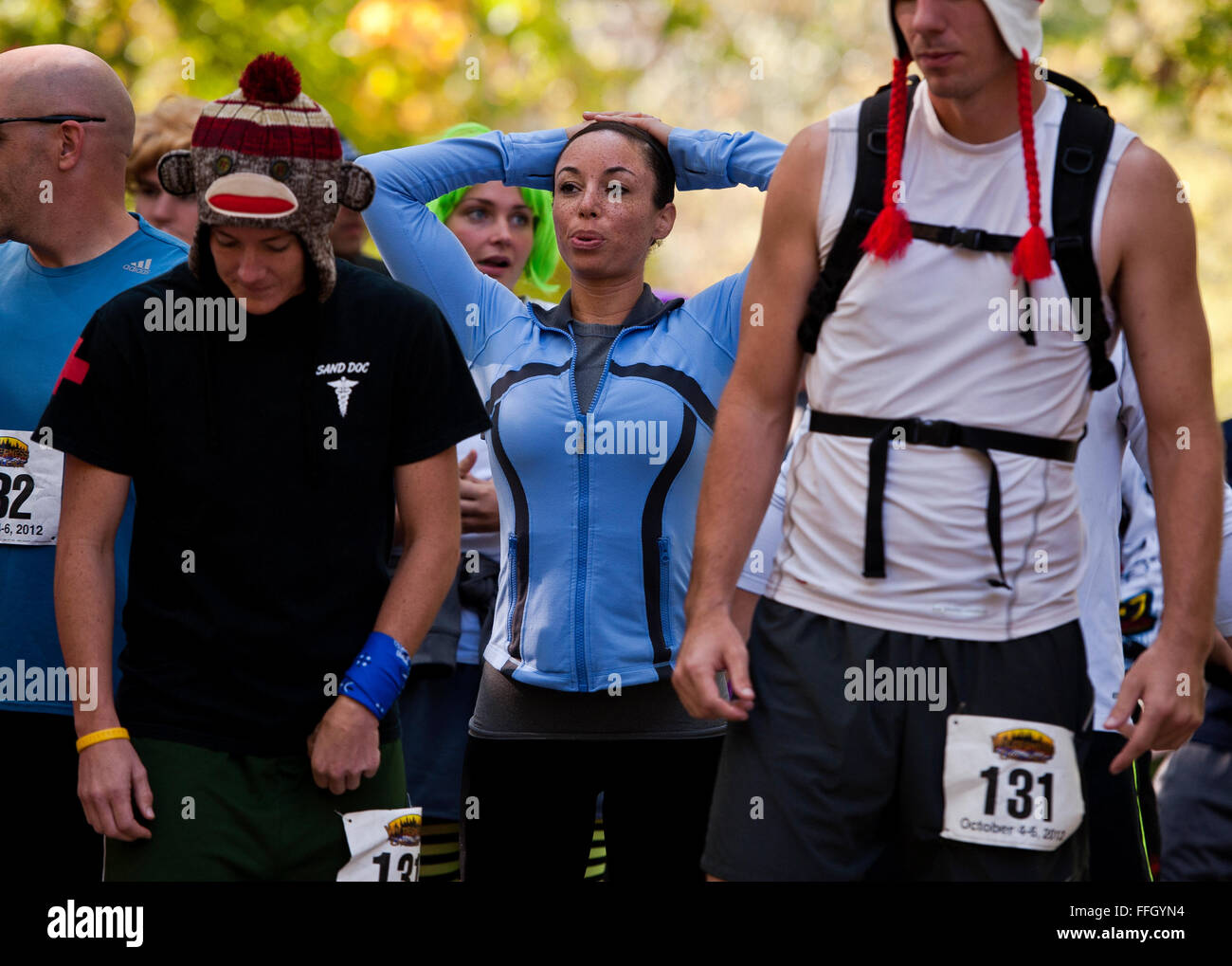 In anticipation, Capt. Melissa Day exhales slowly before the start of the eight-kilometer mountain run. The run is one of five parts of the Wilderness Challenge, which is held in the Appalachian Mountains of West Virginia. Stock Photo