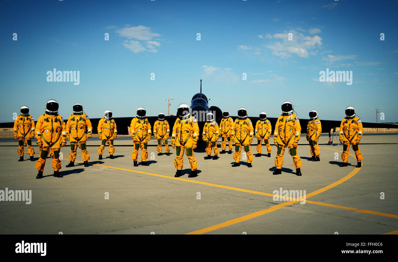 Fourteen U.S. Air Force U-2 instructor pilots from the 1st Reconnaissance Squadron stand in front of a two seat U-2S at Beale Air Force Base, Calif. Less people have piloted the U-2 than have earned Super Bowl rings. Stock Photo