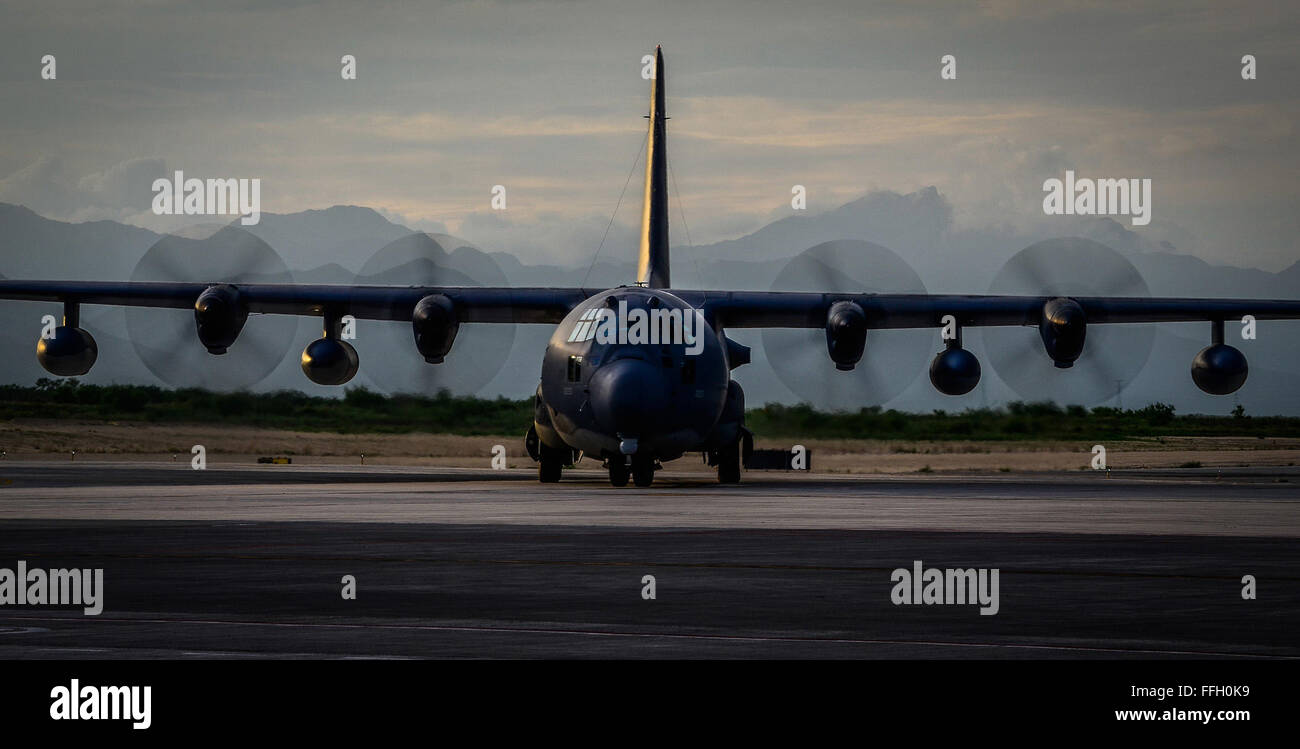 A MC-130P Combat Shadow aircraft lands while taking part in a long range, over water search and rescue mission that originated 1,400 miles off the Coast of Acapulco, Mexico Sept. 9, 2012. This was a joint mission involving the U.S. Coast Guard Cutter Morgenthau and saved the lives of two injured Ecuadorians. The aircraft is assigned to the California Air National Guard 129th Rescue Wing. Stock Photo