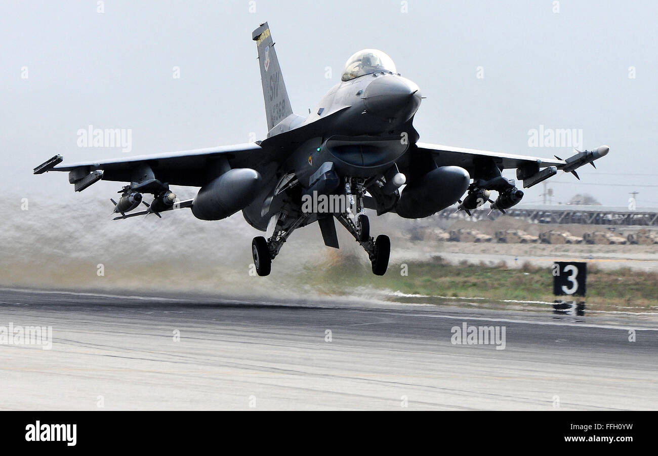 An F-16 Fighting Falcon deployed from Shaw Air Force Base, S.C., takes off from Bagram Airfield, Afghanistan. The F-16's mission in Afghanistan is to provide tactical air-to-air and air-to-ground support for Operation Enduring Freedom. Stock Photo