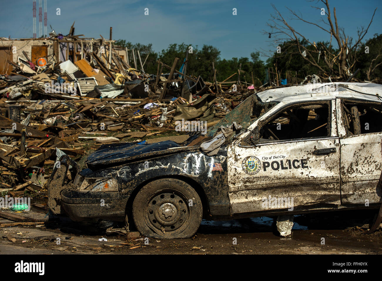 A police car was destroyed by a tornado May 22, 2013, in Moore, Okla. The EF-5 tornado, with winds reaching at least 200 mph, traveled for 20 miles, leaving a two-mile-wide path of destruction, leveling homes, crushing vehicles, and killing more than 20 people. More than 115 Oklahoma National Guard have been activated to assist in the rescue and relief efforts. Stock Photo
