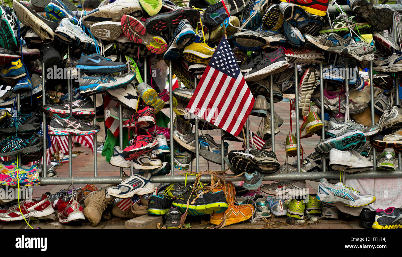 Shoes left as a tribute to the Boston Marathon bombing victims make up