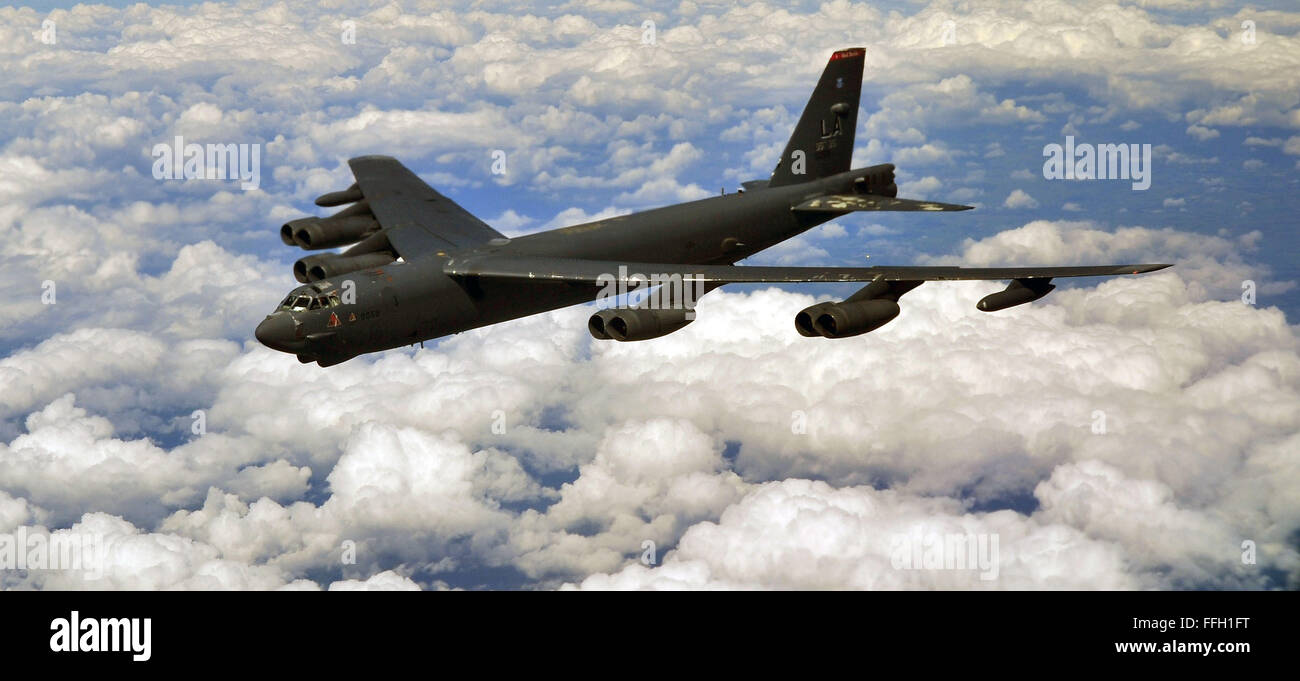A B-52H Stratofortress prepares to receive fuel from a KC-135 Stratotanker while flying over the United Kingdom. The B-52H was deployed to RAF Fairford, England, from Barksdale Air Force Base, La. Stock Photo
