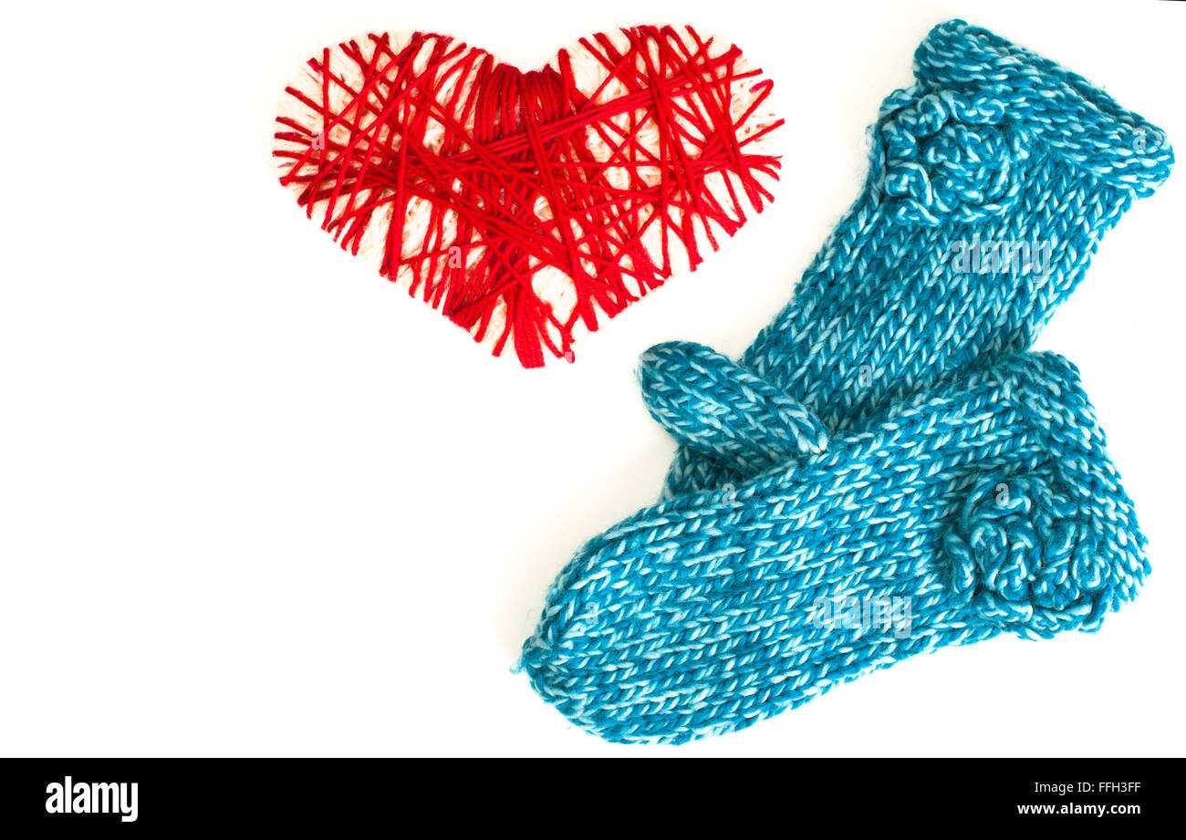 Mittens and woven red heart valentine card Stock Photo
