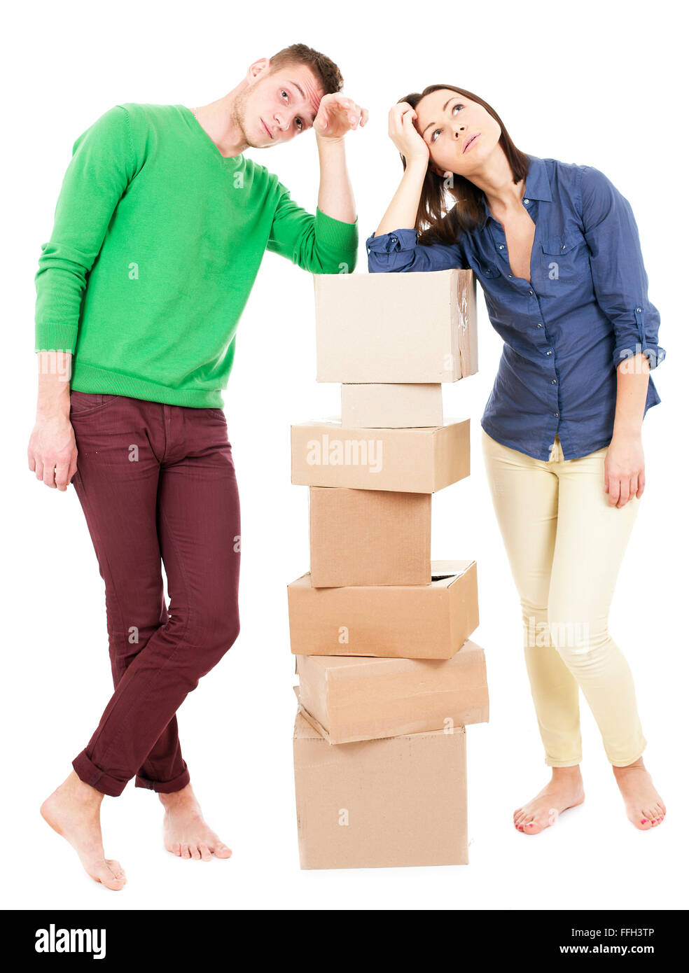 Young Couple With Moving Boxes - Isolated - Stock Image Stock Photo