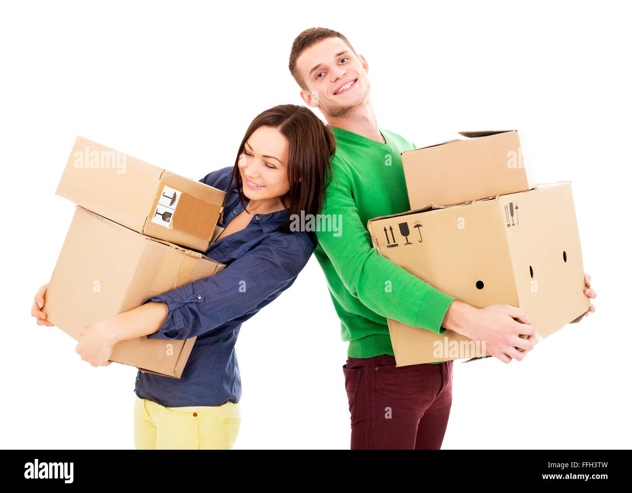 Young Couple With Moving Boxes - Isolated - Stock Image Stock Photo