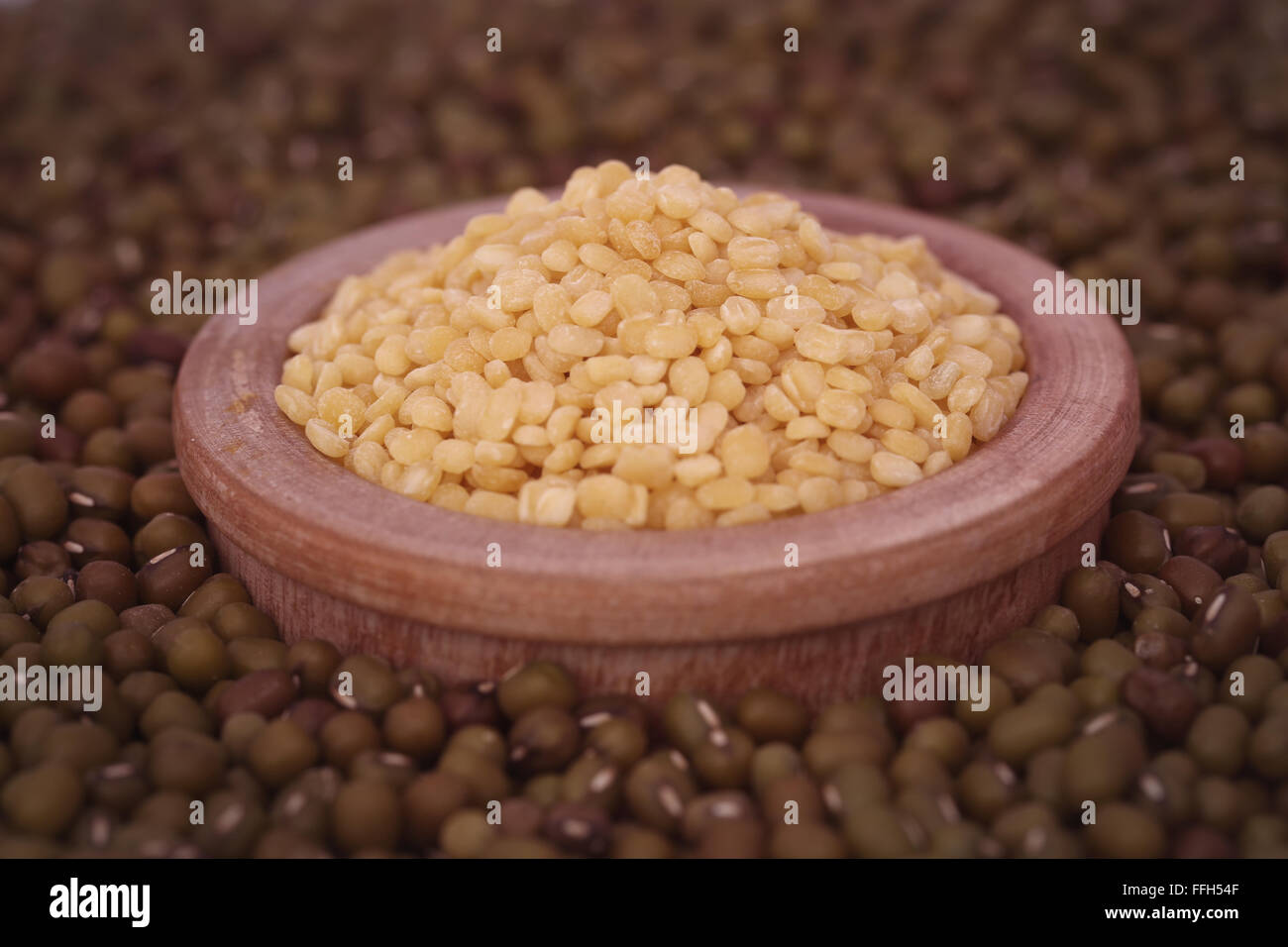Dry mung bean in wooden bowl Stock Photo