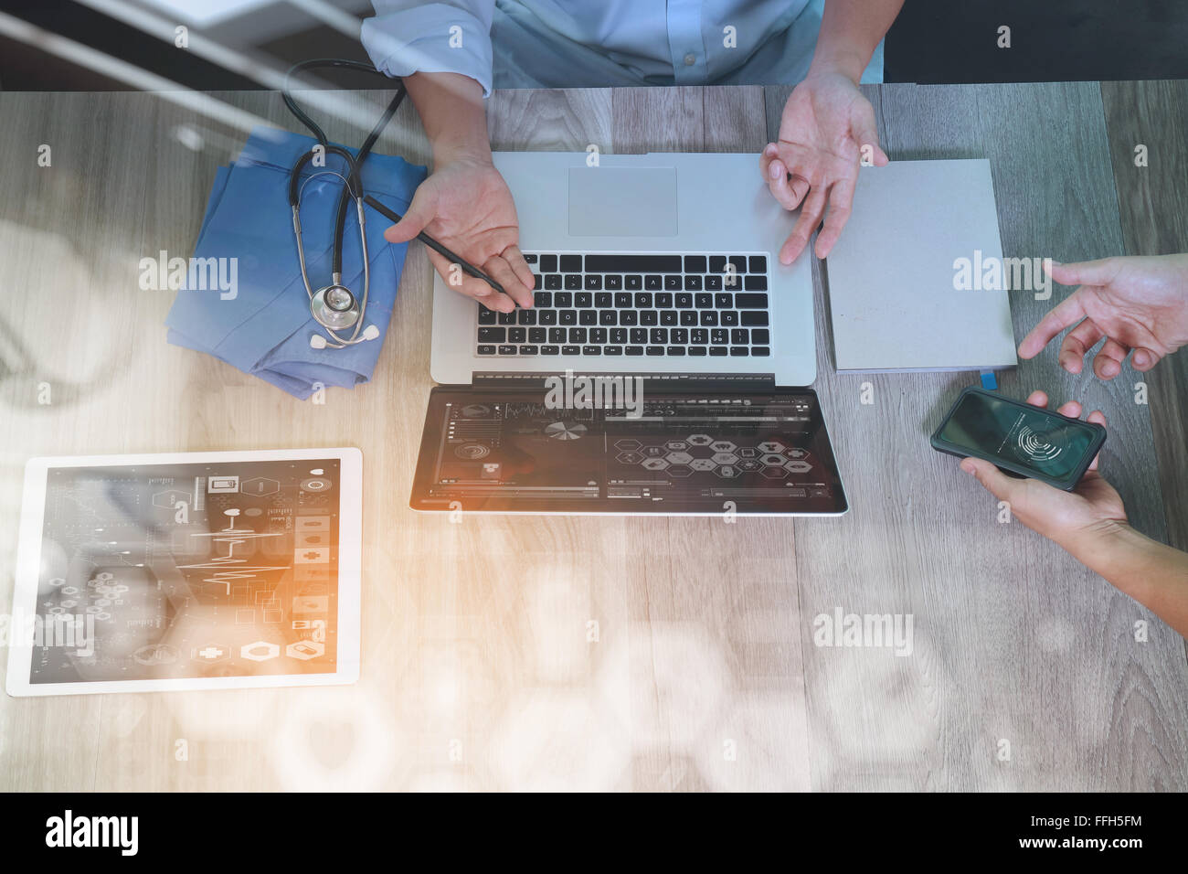 top view of Medicine doctor hand working with modern computer and ...
