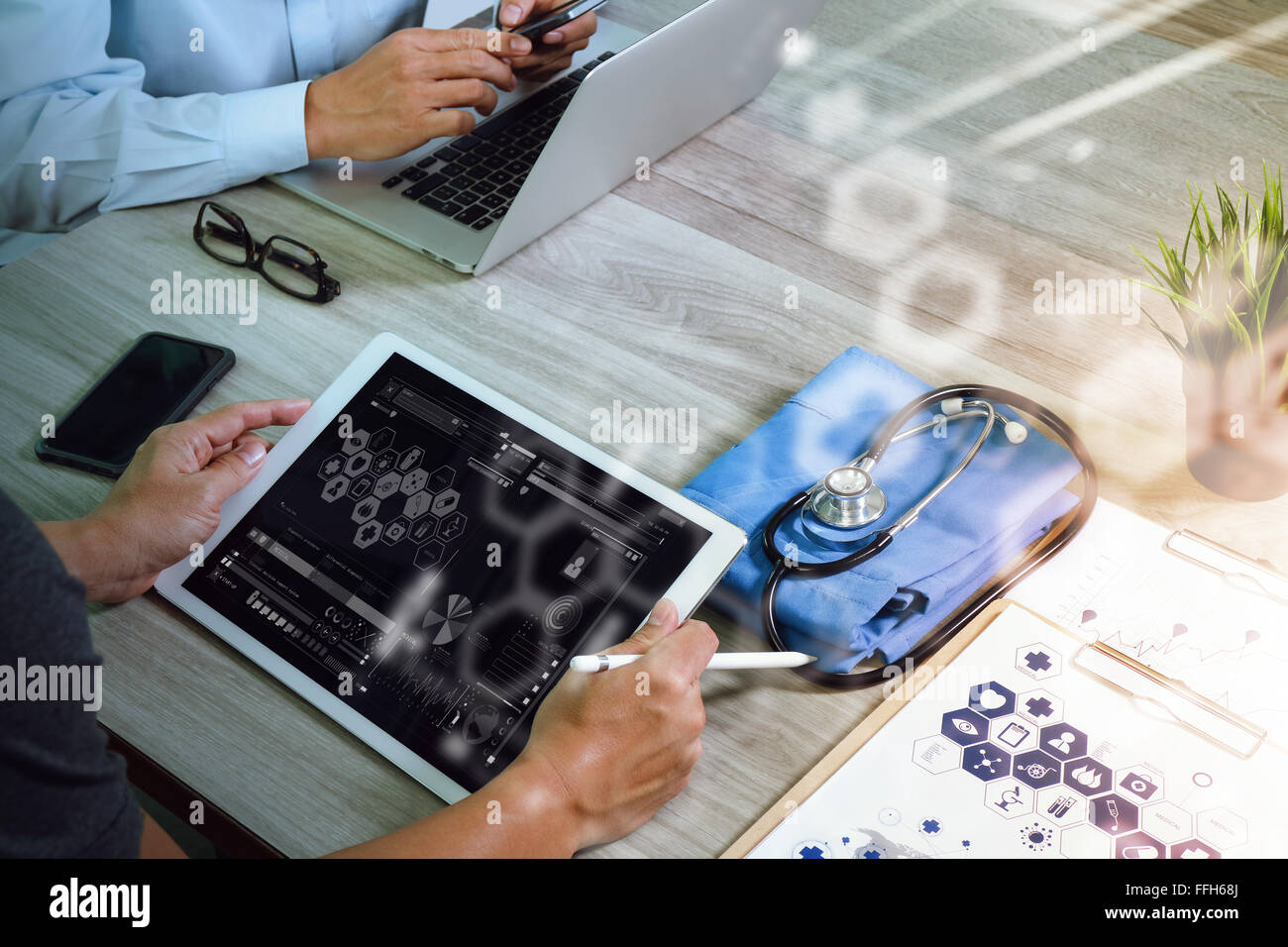 top view of Medicine doctor hand working with modern computer and ...