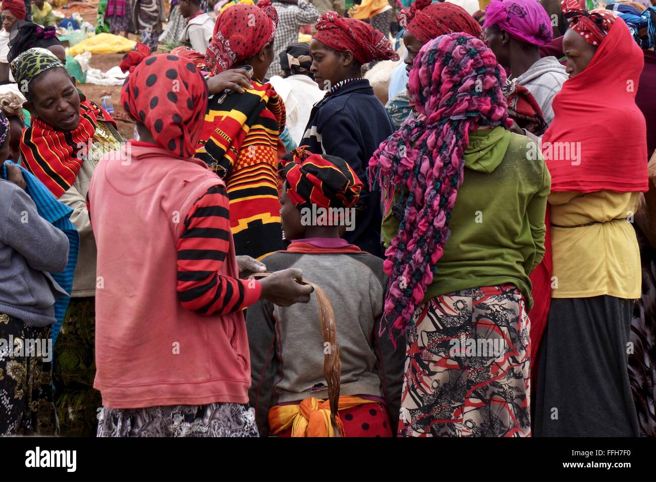 LAdies in bright colours at an African market Stock Photo
