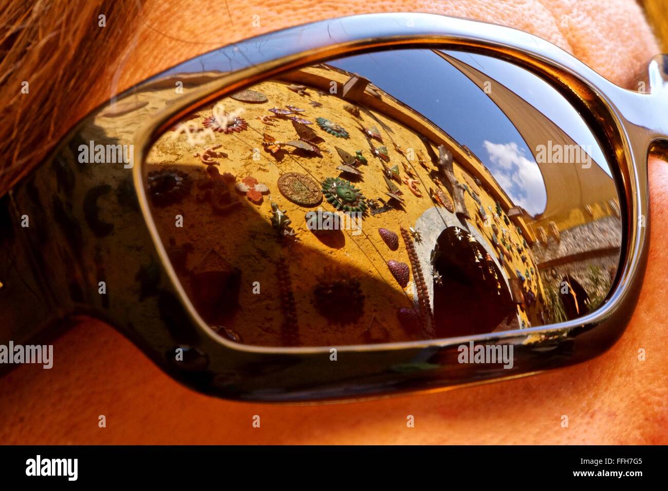 wall hangings reflected in sunglasses Stock Photo