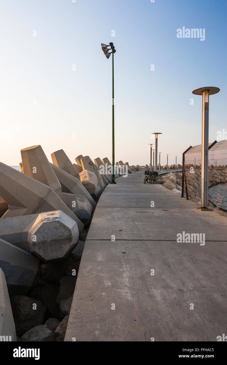 road and concrete barriers at the dock Stock Photo