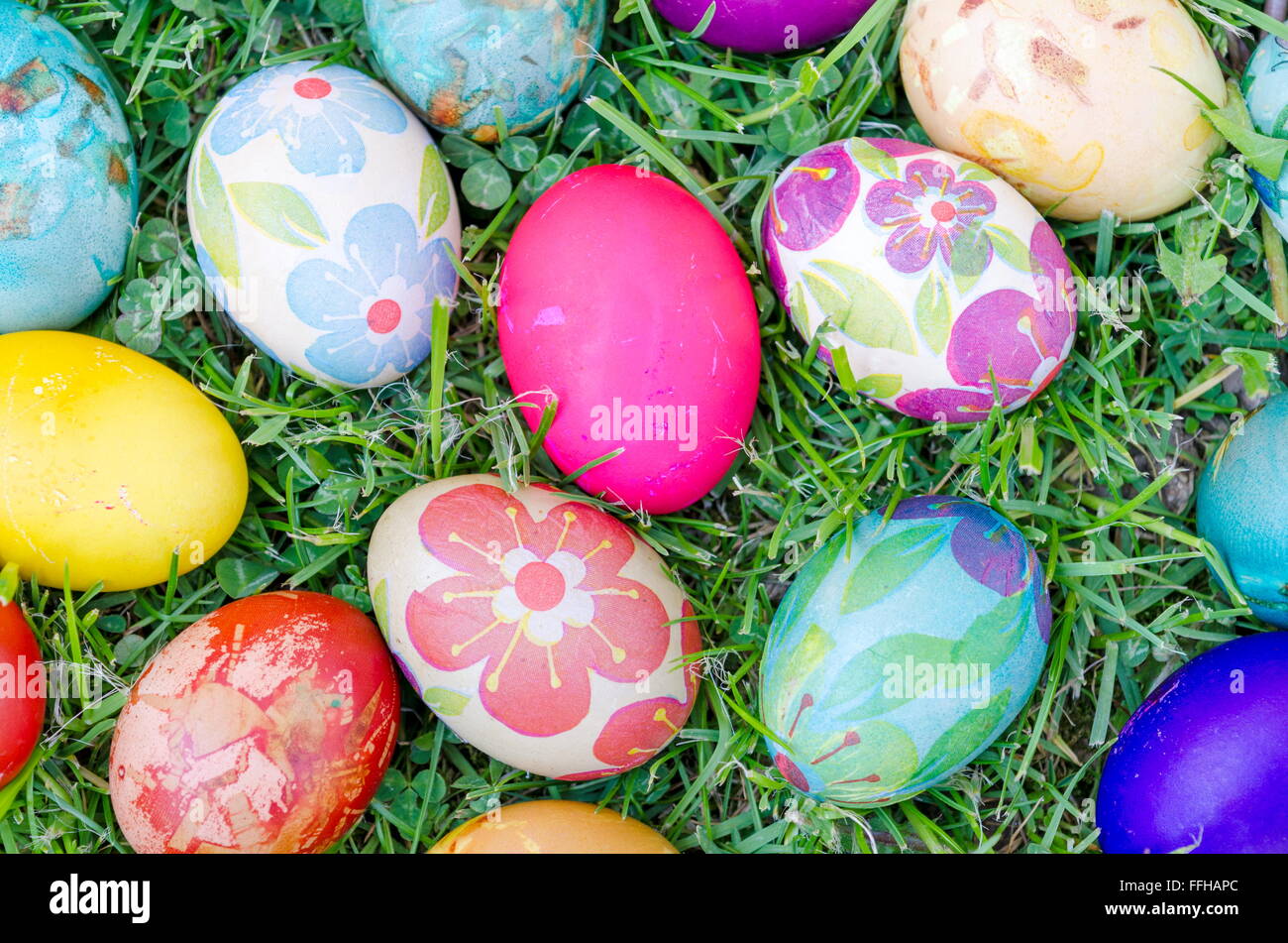 Hand painted decoupage Easter eggs on the green grass Stock Photo