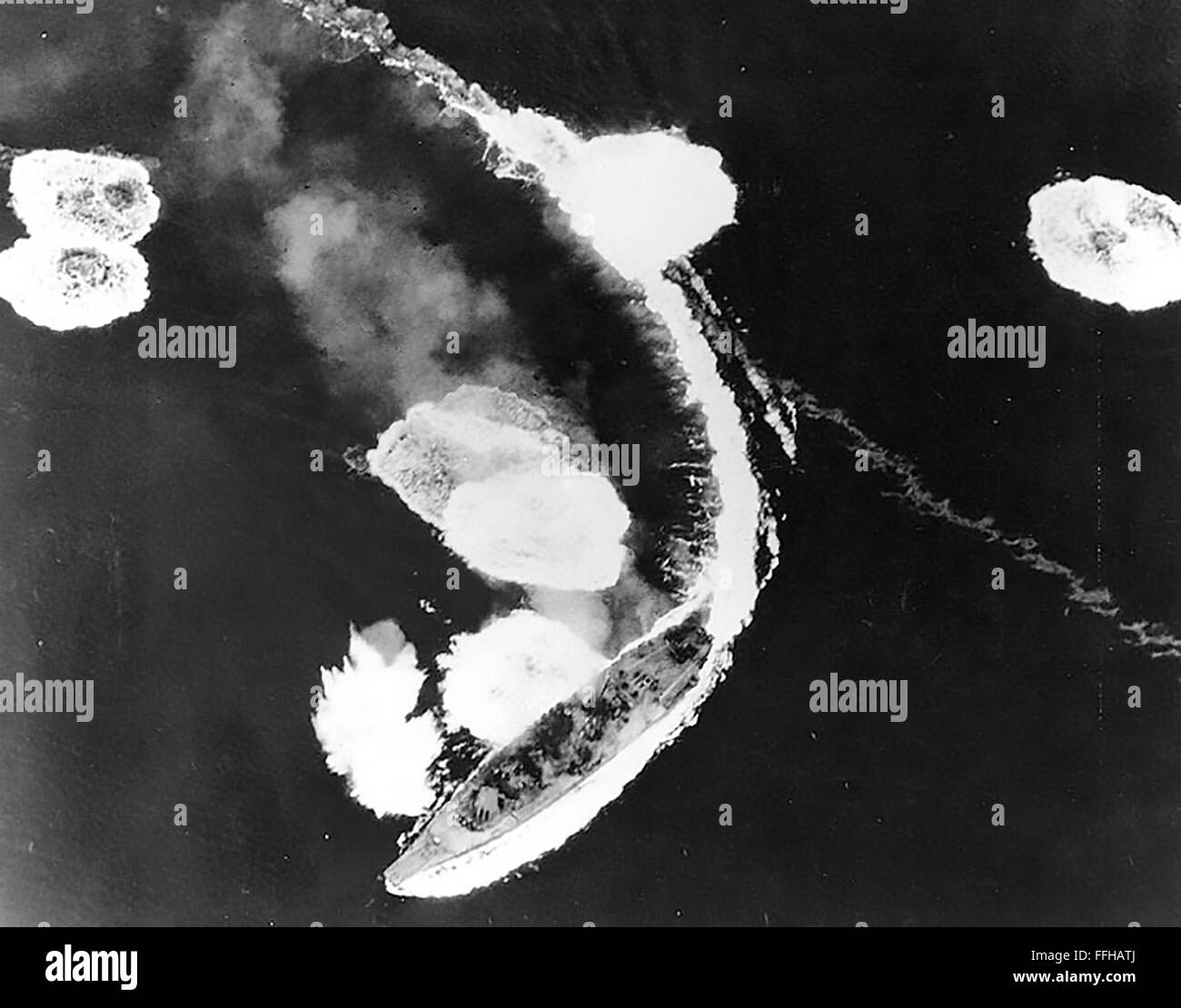 JAPANESE BATTLESHIP YAMATO under attack by the US Navy Task Force in the Seto Inland Sea  off the Japanese port of Kure in south west Japan on 19 March 1945. The ship was only lightly damaged but finally sunk on 7 April. Stock Photo