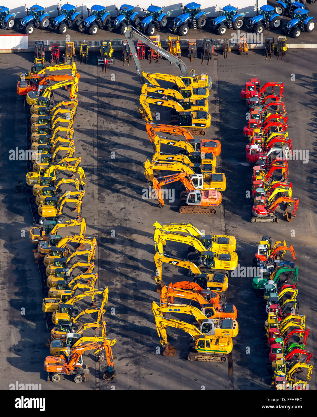 Aerial view, excavators, mini excavators, sales area for used heavy equipment, yellow excavators