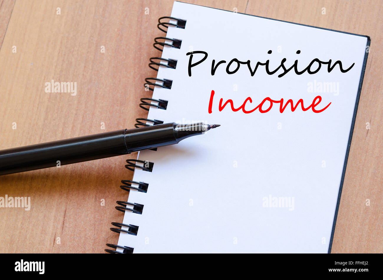 Provision income text concept write on notebook Stock Photo