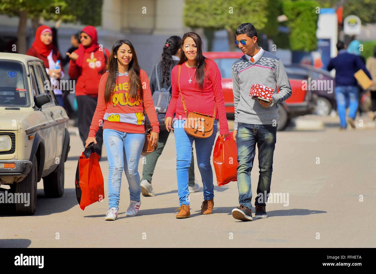 Cairo, Egypt. 14th Feb, 2016. Egyptian students celebrate on Valentine