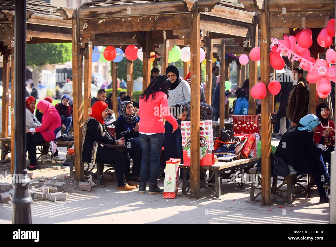 Cairo, Egypt. 14th Feb, 2016. Egyptian students celebrate on Valentine