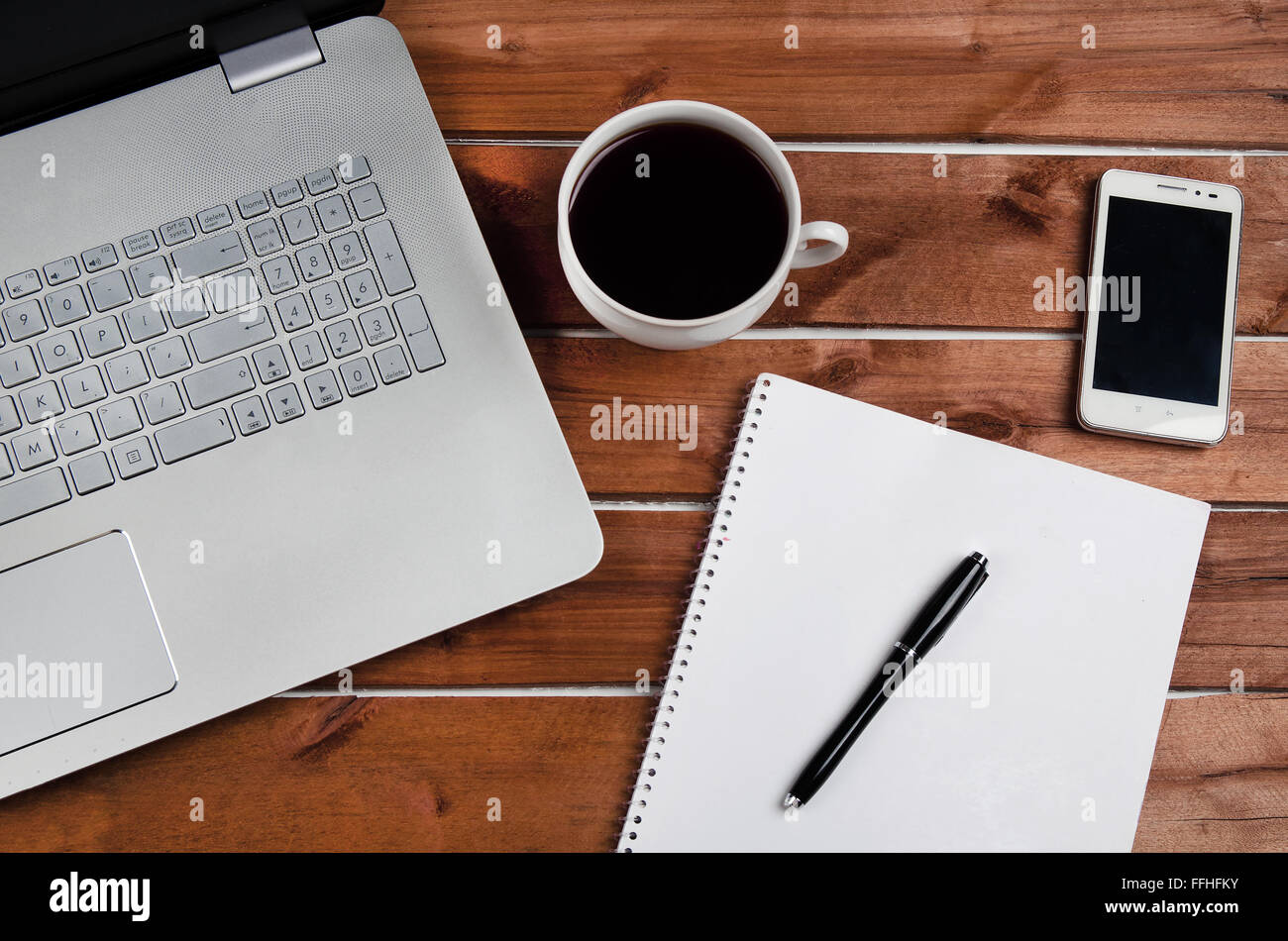 Coffee Table With Laptop And Notebook Stock Photo Alamy