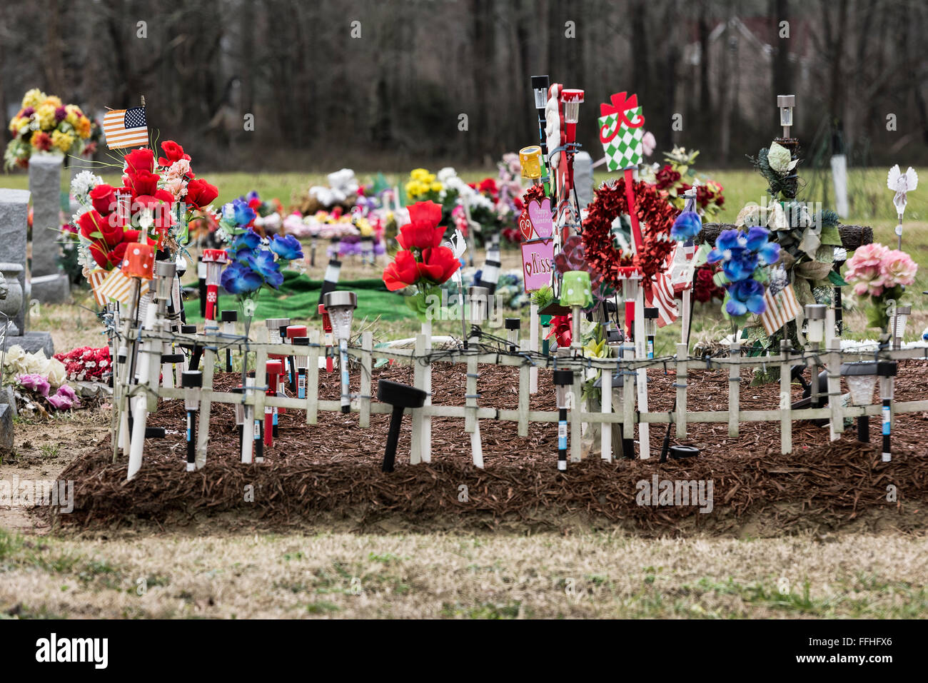 A heavily decorated grave site, USA Stock Photo
